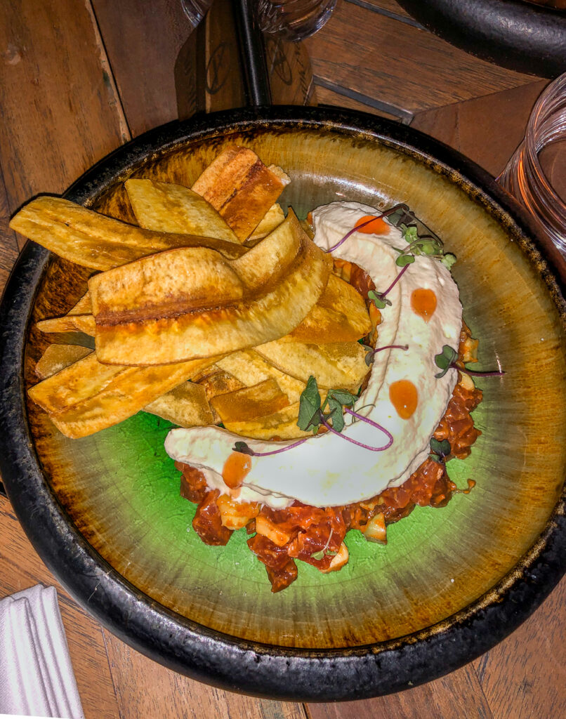 Dubai_restaurant_MamaZonia_food_green_plate_table_red_yellow